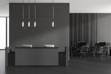 Dark reception interior with pc desktop and computers with seats on grey concrete floor. Business coworking workplace with window on city view, 3D rendering