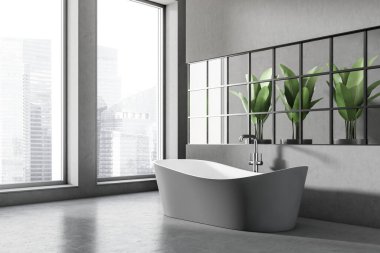 Dark bathing room interior with tub, side view, plant in pot and panoramic window with Singapore city view. Hotel washing room with grey concrete floor. 3D rendering