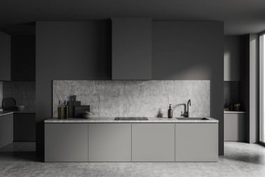 Dark kitchen interior cabinet with sink, stove and hood. Deck with kitchenware, shelves on grey concrete floor and window. 3D rendering