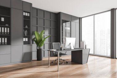 Corner view on dark office room interior with desktop, shelves, panoramic windows with Singapore city skyscraper view and wooden floor. Concept of place for working process and meeting. 3d rendering
