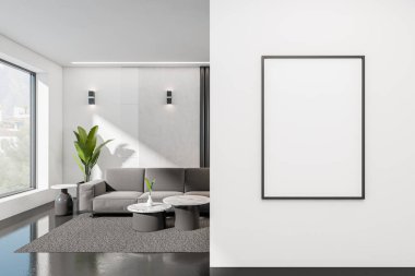 Modern oturma odasının içinde kanepe, sehpa ve koyu beton zemin var. Kırsal kesimde panoramik pencere. Girişten önce maket posteri asılacak. 3B görüntüleme