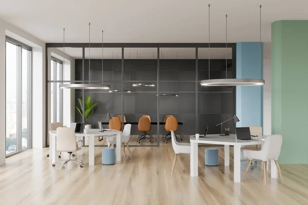 Front view on bright office room interior with panoramic window with Singapore view, armchair, desk with laptops and oak wooden floor. Concept of place for working process and meeting. 3d rendering