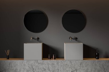 İki lavabo ve yuvarlak aynalı koyu banyo içi, banyo aksesuarlarıyla gri beton standı, sazlık ayırıcı ve banyo jeli. 3B görüntüleme