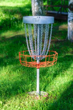 landscape from the park, summer morning, disc golf cart in a birch grove