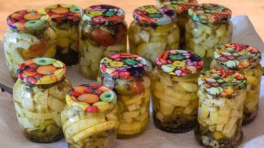 picture with glass jars, storing products for the winter, home canning concept