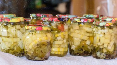picture with glass jars, storing products for the winter, home canning concept