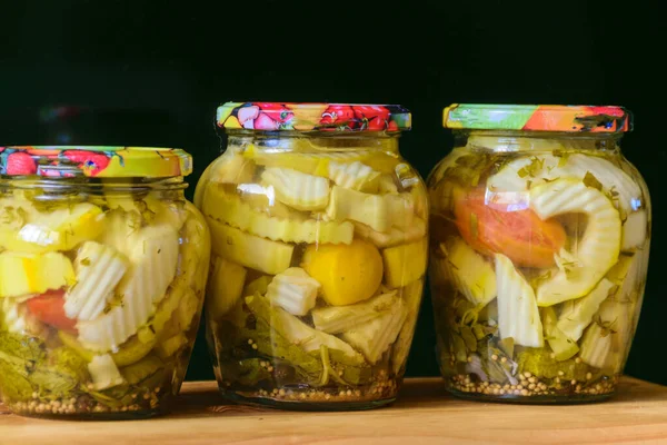 picture with glass jars, storing products for the winter, home canning concept
