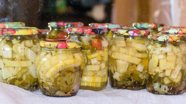 picture with glass jars, storing products for the winter, home canning concept