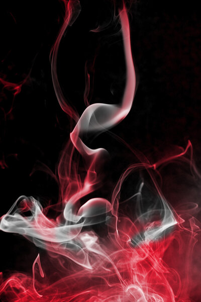 Abstract coloured red smoke in the shape of wine glass
