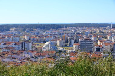Manavgat city aerial panoramic view in the Antalya region in Turkey from the Turkbeleni Ormani, turkish flag monument