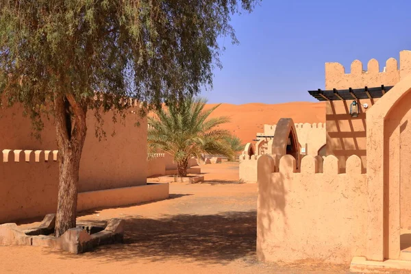 Bedouin style camping beside a huge sand dune at the Wahiba Sands desert in Oman.