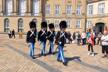 May 23 2022 - Copenhagen, Denmark: Guards marching outside royal palace at Amalienborg
