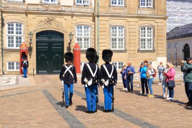 May 23 2022 - Copenhagen, Denmark: Guards marching outside royal palace at Amalienborg