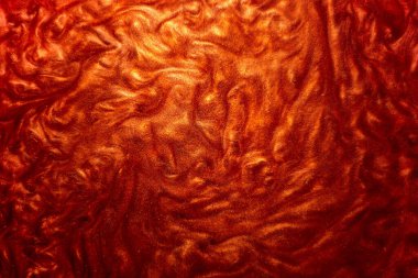 Odaklanamadım. Küçük bir alan derinliği olan kırmızı parlak parçacıklar. Şenlikli büyülü, pırıl pırıl bir arka plan. Neşeli kıvılcımlar ve ışıklar. Soyut arkaplan.