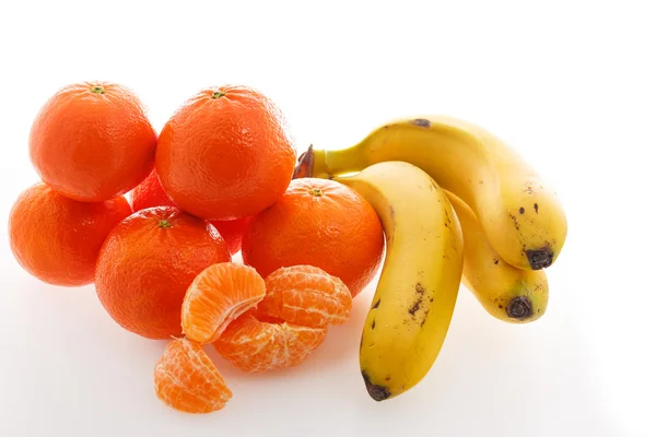 Platanos and tangerines — Stock Photo, Image