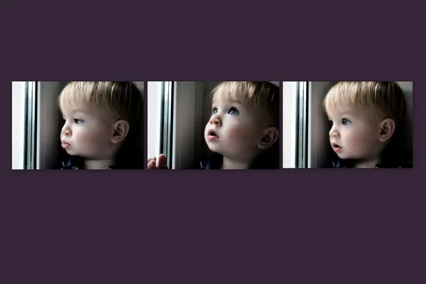 Little boy looking out the window — Stock Photo, Image