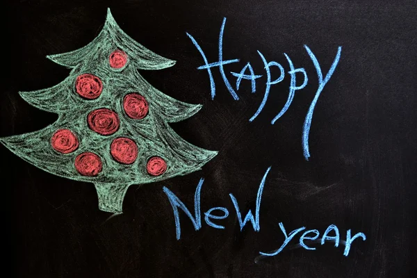 L'iscrizione e il disegno di alberi sulla lavagna "felice anno nuovo " — Foto Stock