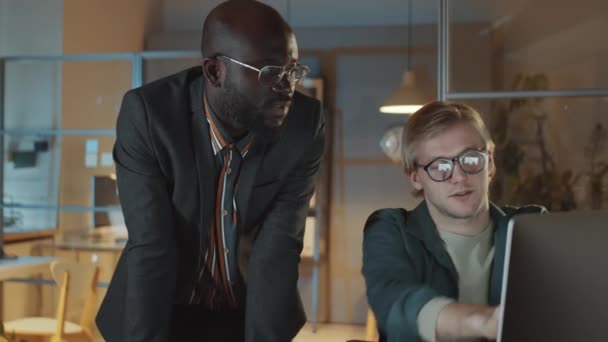 Caucasian African American Male Colleagues Discussing Business Project Computer While — Stock Video