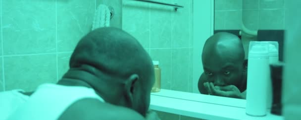 African American Man Looking Bathroom Mirror Rinsing Mouth Water Brushing — Stock Video