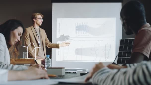 Young Caucasian Engineer Presenting Renewable Energy Project Coworkers Business Meeting — Stock Video