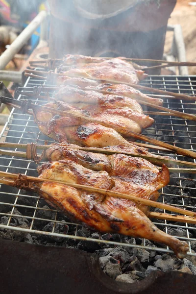 Grilling chicken on the stove — Stock Photo, Image