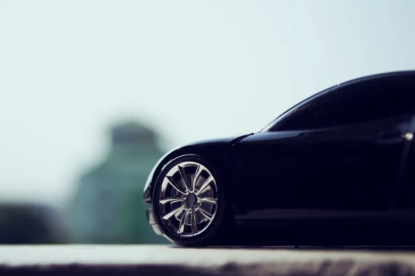 Black car in retro concept — Stock Photo, Image