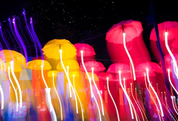 Snelheid van paraplu's neon licht — Stockfoto