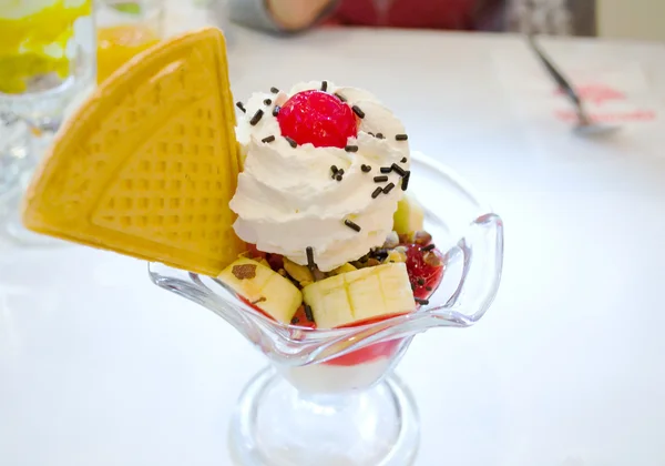 Ice cream with a cherry — Stock Photo, Image