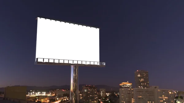 Panneau d'affichage dans la ville de nuit — Photo