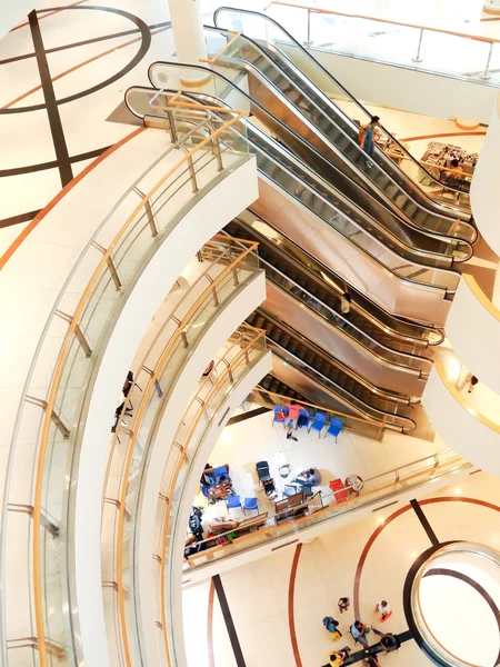 Spiral staircase and escalator. — Stock Photo, Image