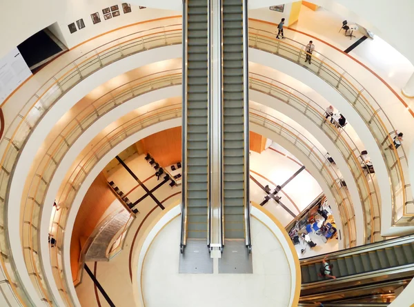 Spiral staircase and escalator. — Stock Photo, Image