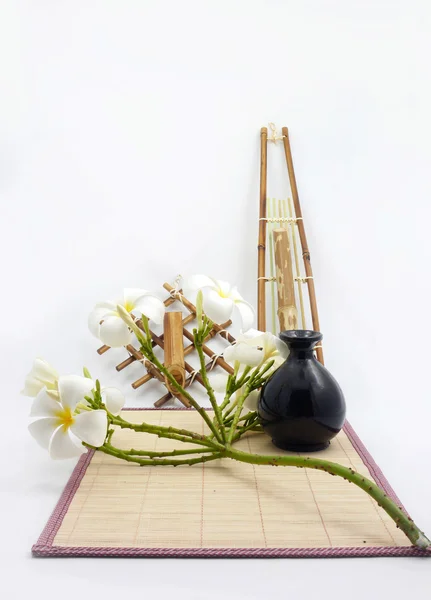 Hanging bamboo basket of flowers. — Stock Photo, Image