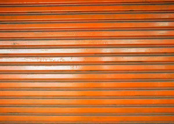 Ståldörrar orange. Stockfoto
