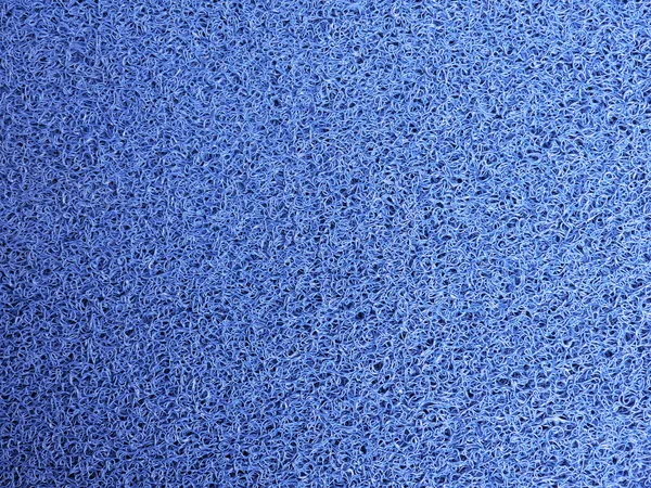 Blaue Fußmatte . Stockbild