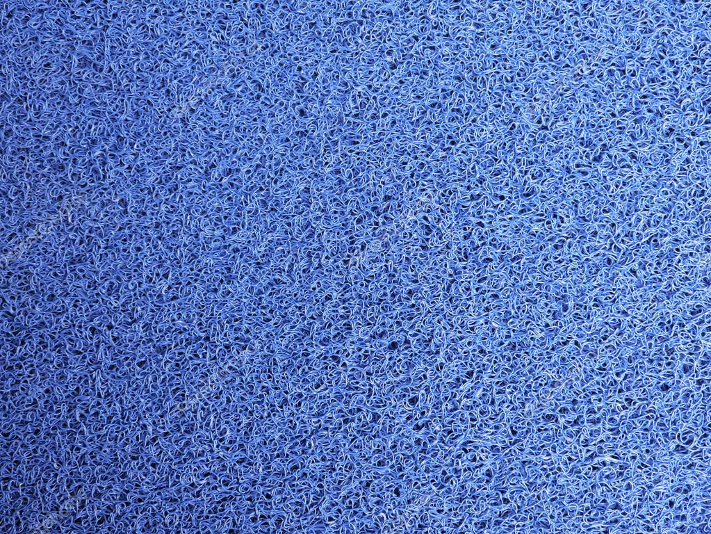 Blue door mat . Stock Photo by ©Araleboy 37233007