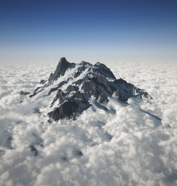 Mountain peak over the clouds