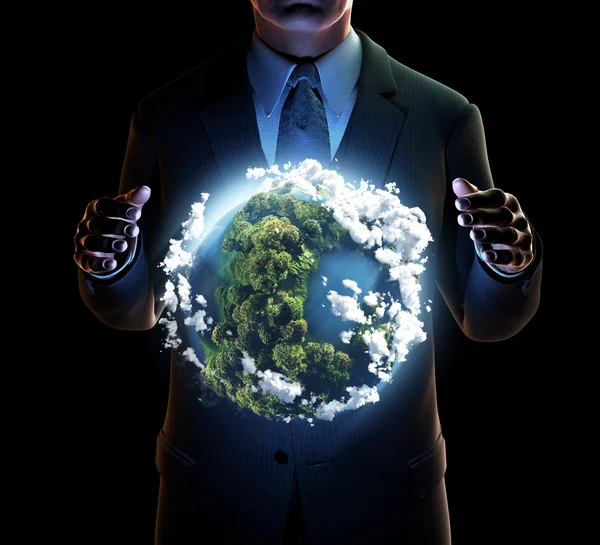 işadamı dünya onun ellerinde tutar.