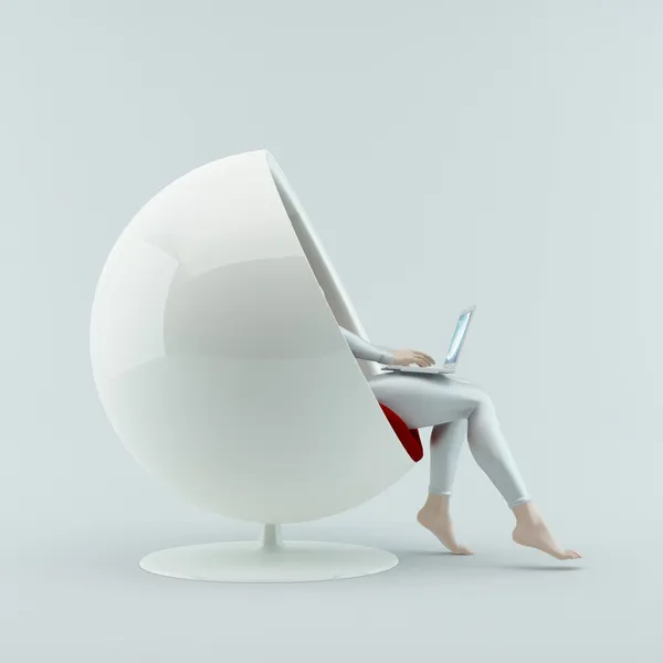 dizüstü bilgisayar ile bir sandalyede oturan kız.