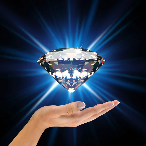 Blue diamond in hands — Stock Photo, Image