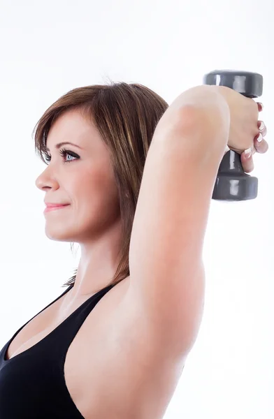 Mujer haciendo ejercicio con pesas — Foto de Stock