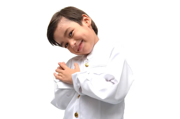 Маленький мальчик в тайском костюме на белом фоне — стоковое фото