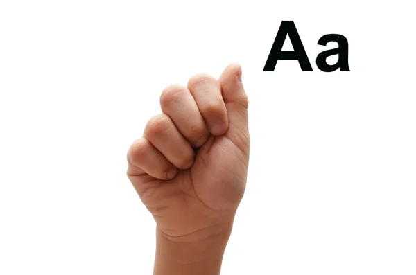 Un niño ortografía mano lenguaje de señas americano ASL — Foto de Stock