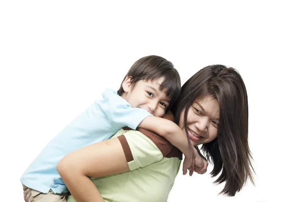 Little boy on mother's back on white background — Stock Photo, Image