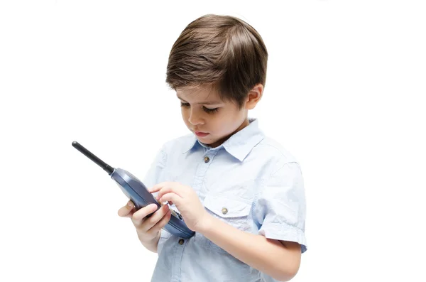 Menino usando telefonema no fundo branco — Fotografia de Stock