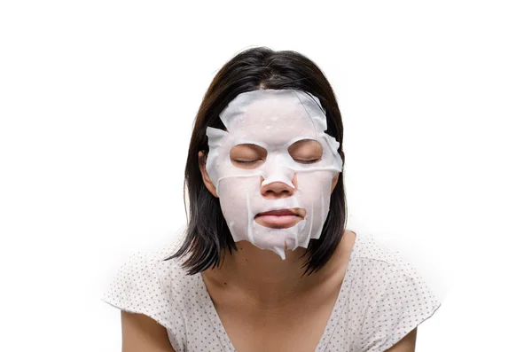 Woman using  facial mask — Stock Photo, Image