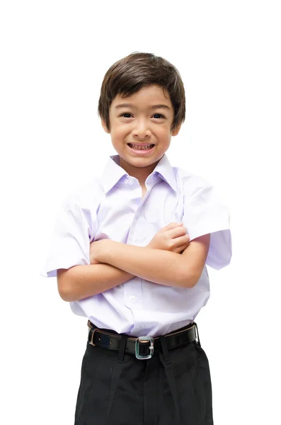 Mały chłopiec studentów w uniformon białe tło — Zdjęcie stockowe