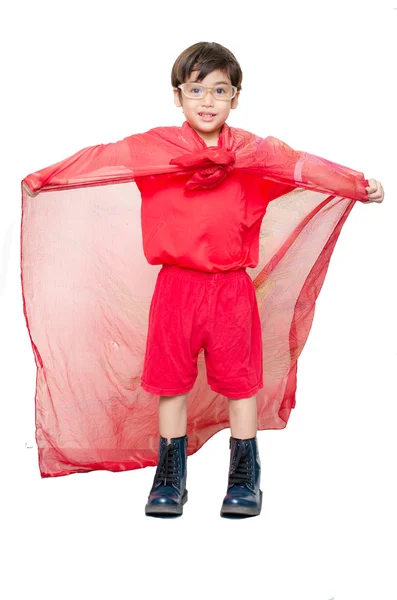 Pequeño niño está vestido como un superhéroe volando —  Fotos de Stock