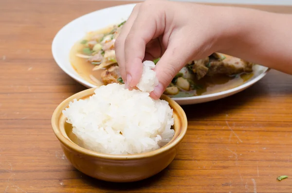 Using hand for eat sticky rice — Stock Photo, Image