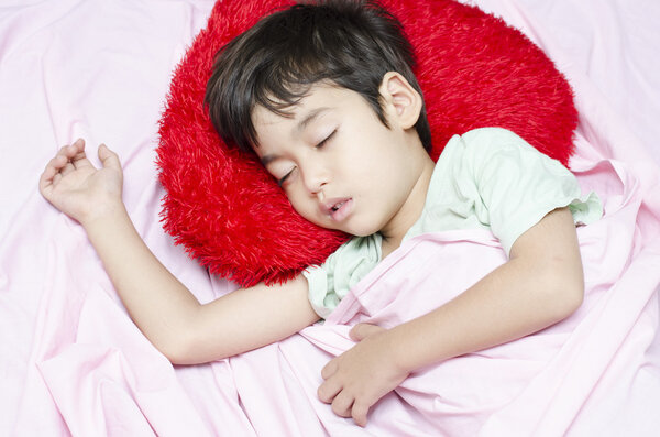 Little boy sleeping at night