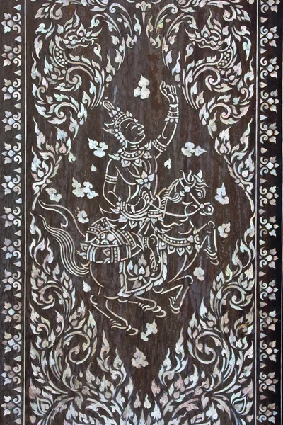 Traditional Thai style art painting on door of the temple — Stock Photo, Image